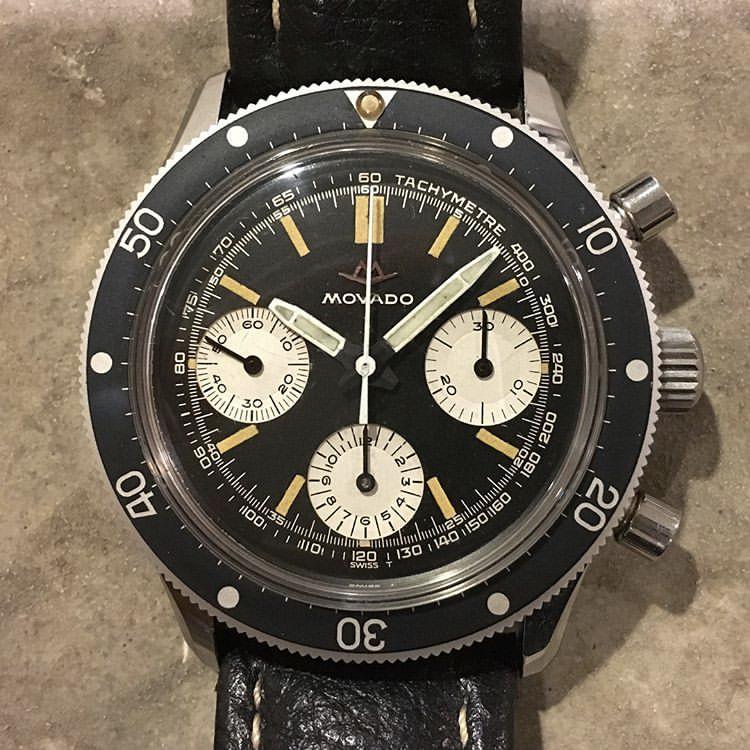 Les chronographes concurrents de l'époque du Rolex Daytona 6265 cadran noir, compteurs blancs. 31PqJb-Movado