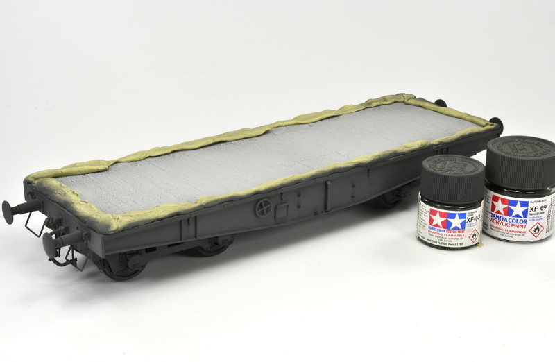 The rail car airbrushed with a mix  Tamiya German Grey and Nato Black